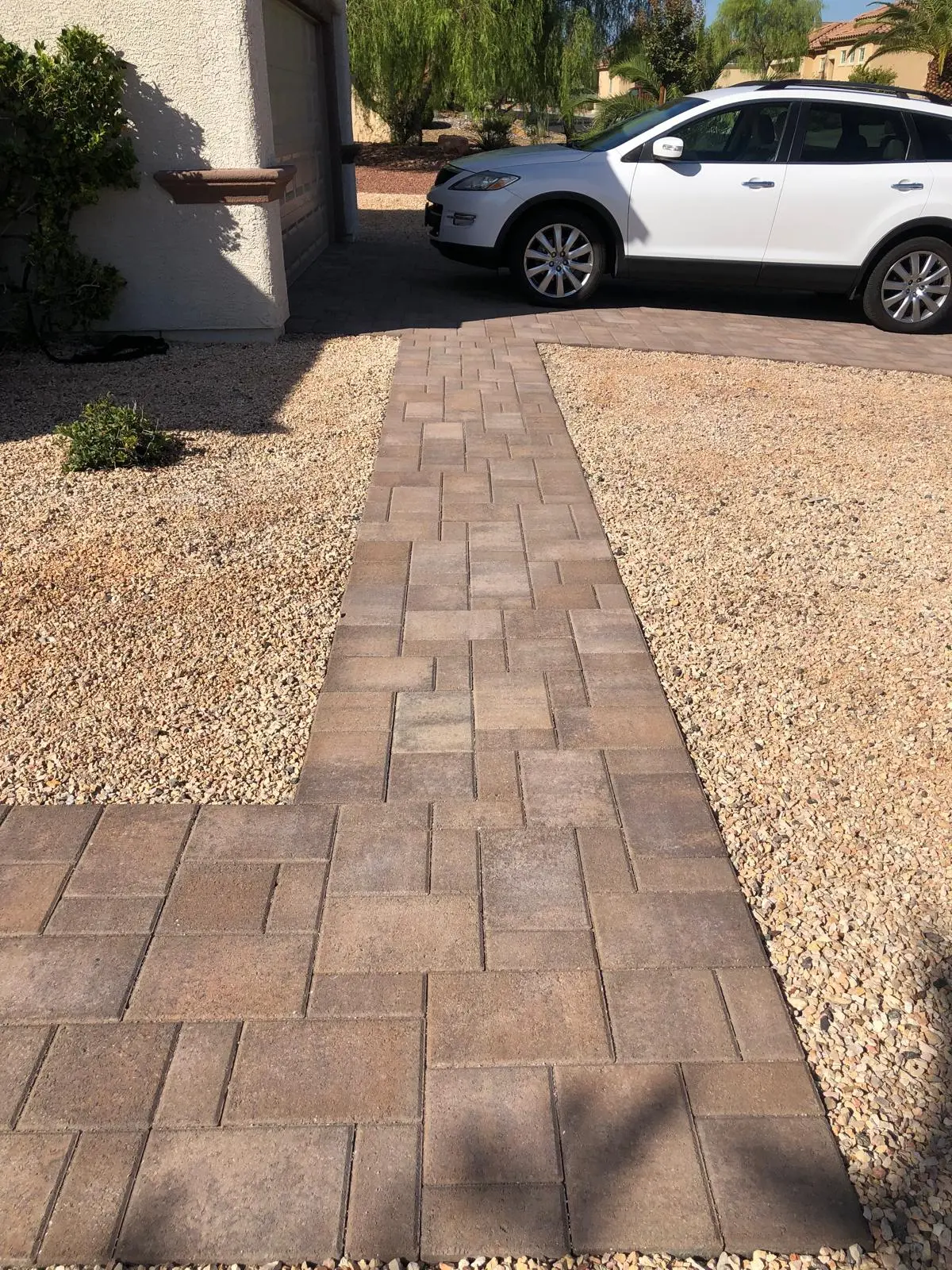 Paver walkway in Las Vegas connecting the driveway to the front door